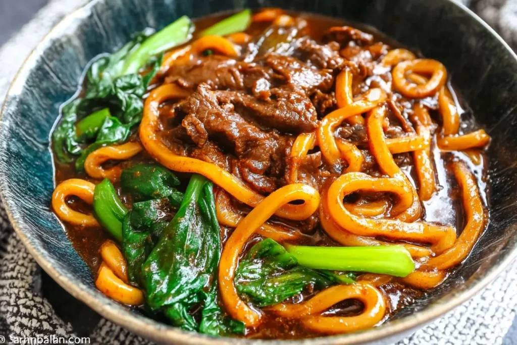 Beef Black Pepper Udon with juicy beef slices, chewy noodles, and fresh greens in savory black pepper sauce.