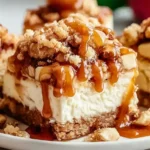 Caramel Apple Cheesecake Bars topped with buttery streusel and rich caramel sauce dripping down the sides
