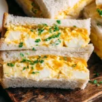 Japanese Egg Sandwich filled with creamy egg salad and fresh microgreens
