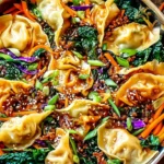 Potsticker Noodle Bowls loaded with vegetables, dumplings, and savory sauce in a skillet.