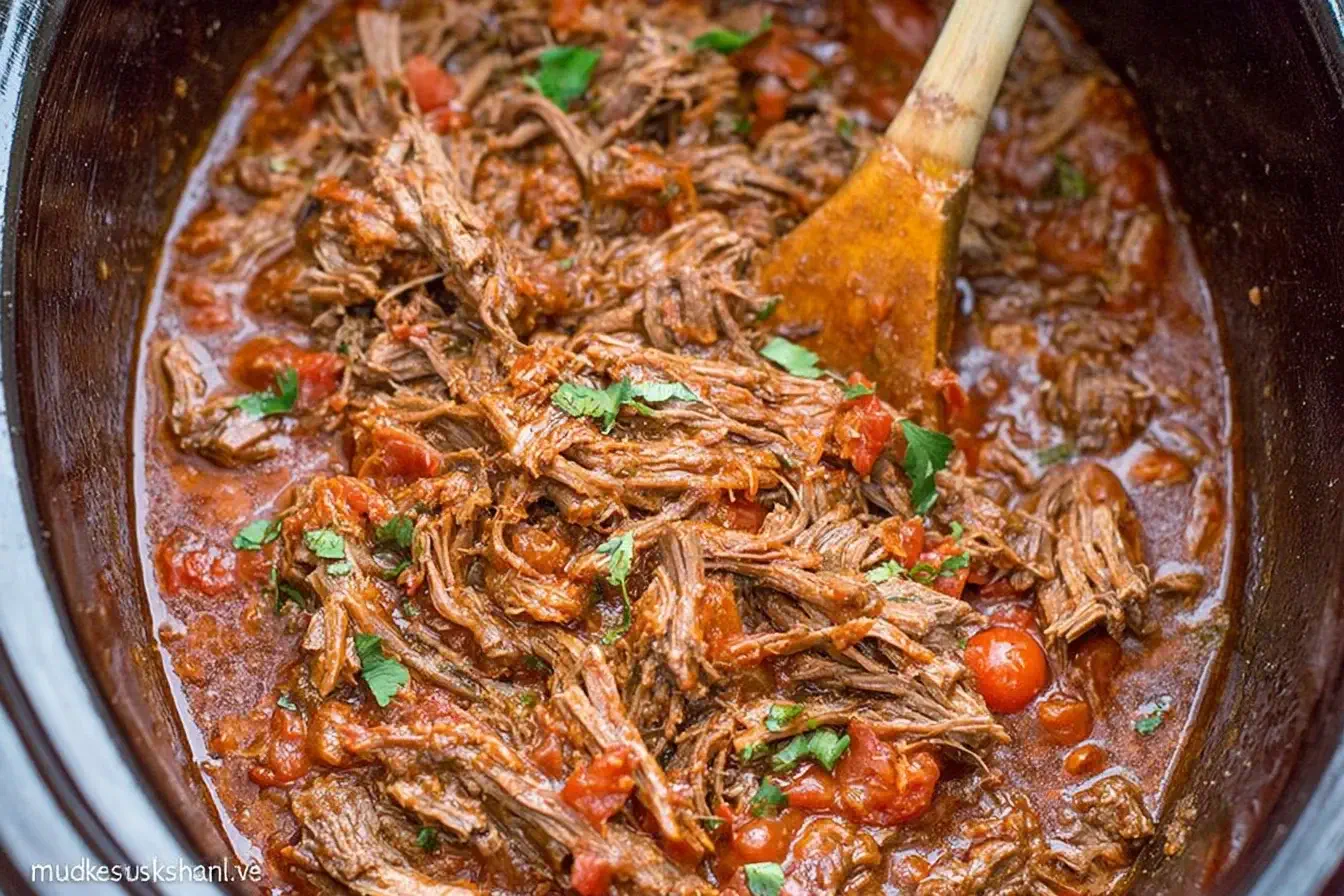 Slow Cooker Italian Beef Ragu with tender shredded beef and rich tomato sauce