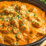 Close-up of creamy Butter Chicken Slow Cooker with fresh cilantro on top