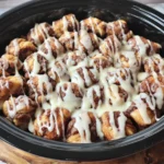 Crockpot Cinnamon Roll Monkey Bread with cinnamon sugar and icing glaze