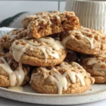 Plate of freshly baked Gilmore Girls Coffee Cake Cookies drizzled with vanilla glaze and cinnamon crumble.