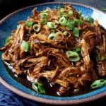 Slow Cooker Hoisin Chicken Recipe with tender shredded chicken in a savory sauce