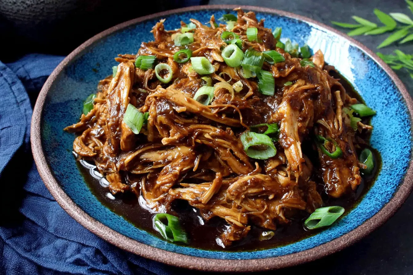 Slow Cooker Hoisin Chicken Recipe with tender shredded chicken in a savory sauce