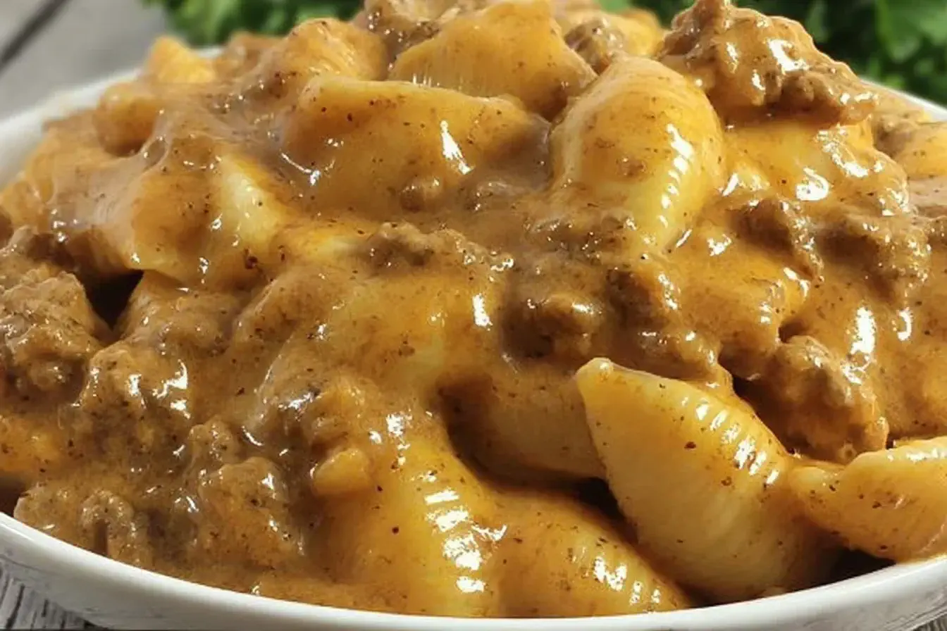 Creamy Crock Pot Taco Shells and Cheese with ground beef and tender pasta shells in a rich, cheesy taco-seasoned sauce