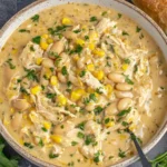 BEST White Chicken Chili recipe with shredded chicken, white beans, and corn served with crusty bread