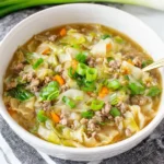 Egg Roll Soup served hot with cabbage, carrots, and ground chicken