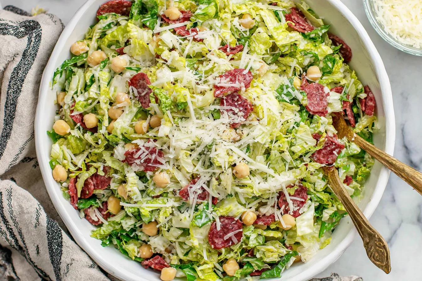 Famous La Scala Chopped Salad Recipe tossed with Italian dressing and fresh ingredients