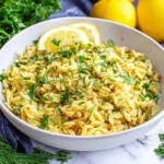 Greek Orzo with Lemon and Herbs served warm with fresh dill and lemon wedges