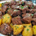 Slow Cooker Garlic Butter Beef Bites and Potatoes with tender beef and golden potatoes in a rich garlic butter sauce
