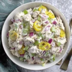 Cottage Cheese Chicken Salad with Banana Peppers topped with celery, red onion and sliced banana peppers