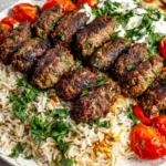 Lebanese Kafta (Beef or Lamb) served with basmati rice and roasted cherry tomatoes