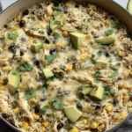 Salsa Verde Chicken & Rice Skillet with shredded rotisserie chicken, long grain rice, black beans, corn and melted Monterey Jack cheese