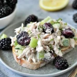 Low Carb Blackberry Cottage Cheese Chicken Salad piled on keto bread with celery and juicy blackberries for a high-protein lunch.